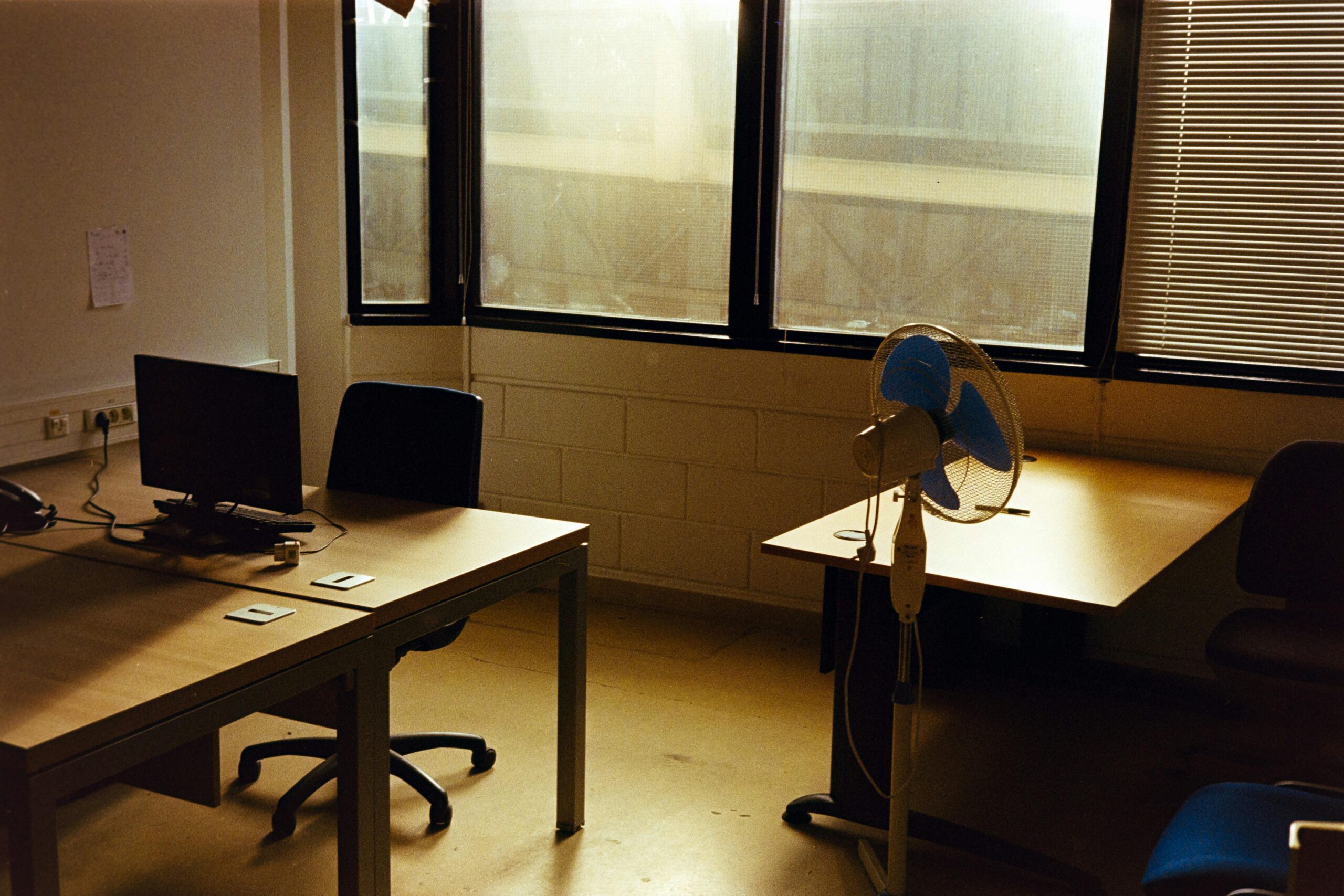 Solitary fan in office, lonely and sad
